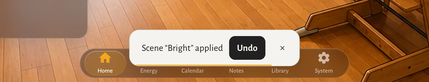 The bottom of the panel after a scene change: a small strip reads 'Scene Bright applied' with an Undo button and a close mark, and a thin gold bar along its lower edge running out.